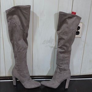 Heeled grey boots